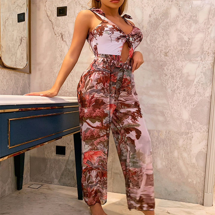 Damern jumpsuit med blommönster och raffinierad snörning Mirla-Eva Jonsson