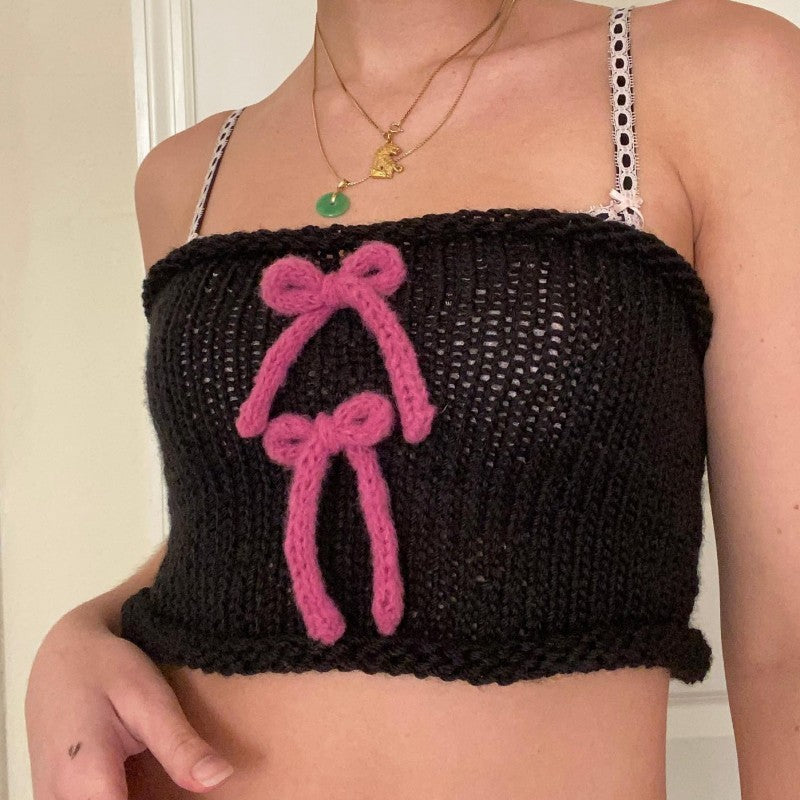 Damern knyten crop-top med dekorativa rosetter Mirla-Eva Jonsson