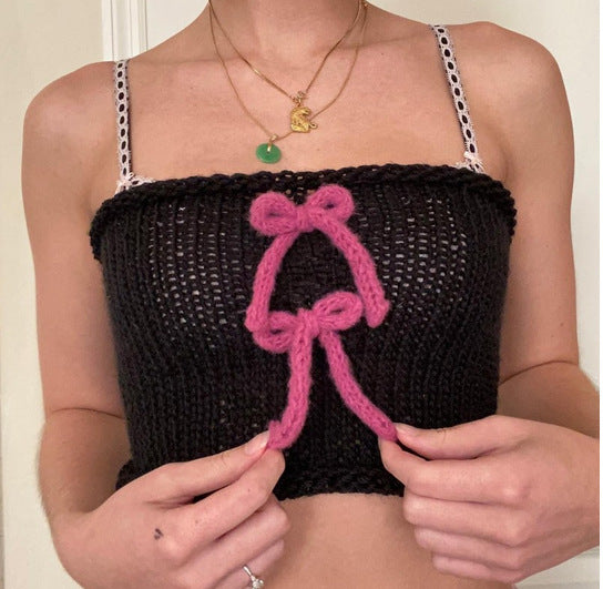 Damern knyten crop-top med dekorativa rosetter Mirla-Eva Jonsson