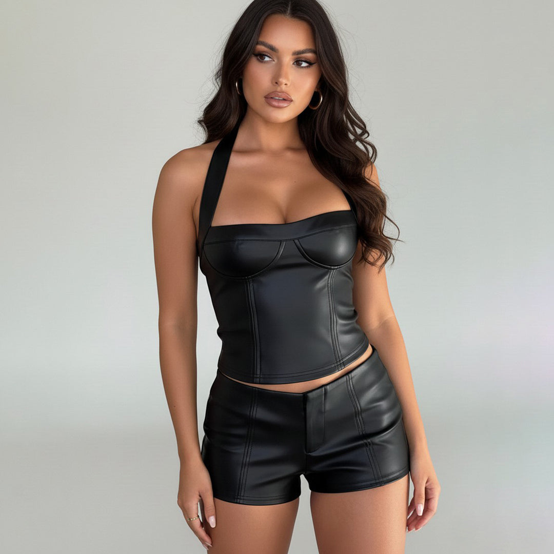 Damern konstläder crop-top med romantisk skärning och förförisk bustier-effekt Mirla-Eva Jonsson