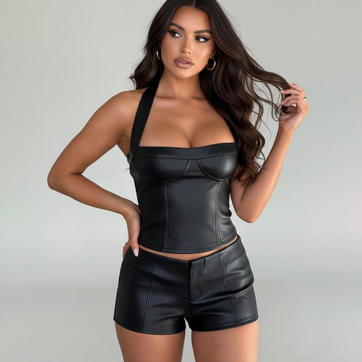 Damern konstläder crop-top med romantisk skärning och förförisk bustier-effekt Mirla-Eva Jonsson