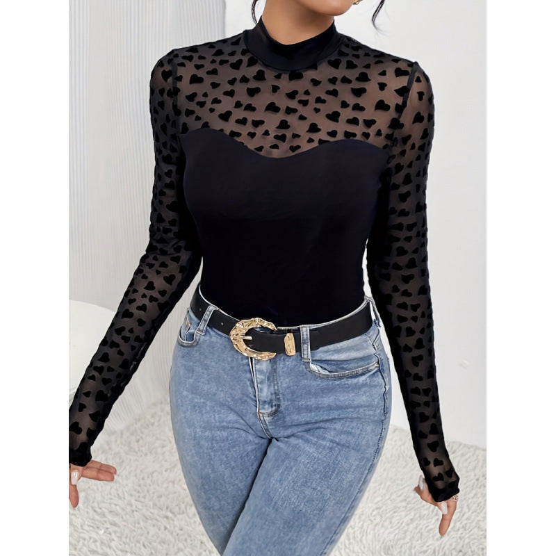 Damern långärmad bodysuit med transparenta hjärtan och elegant ståkrage Mirla-Eva Jonsson