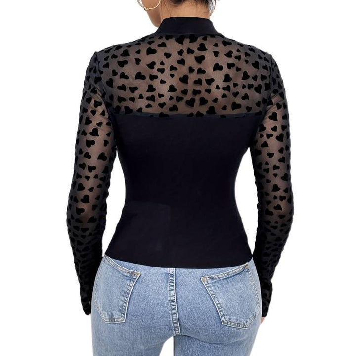 Damern långärmad bodysuit med transparenta hjärtan och elegant ståkrage Mirla-Eva Jonsson