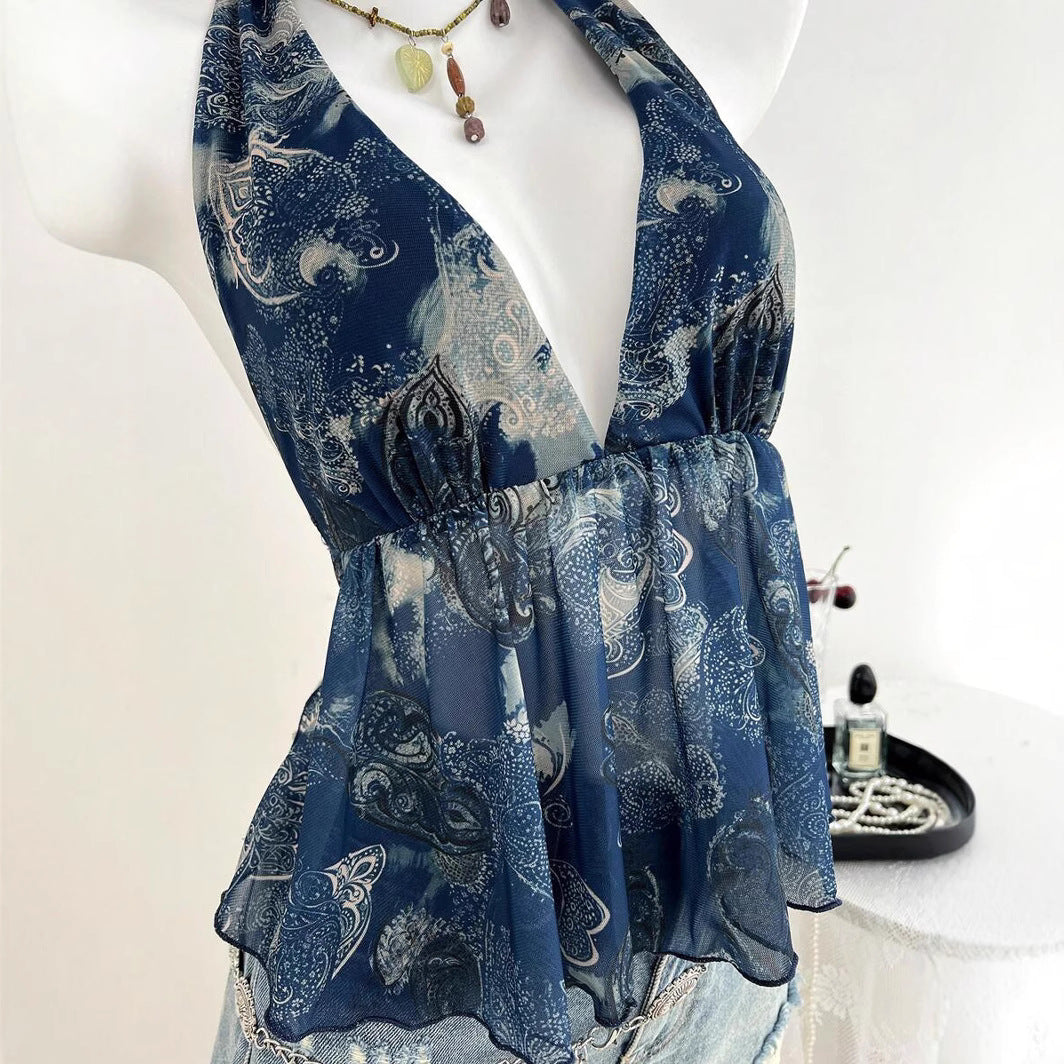 Damern luftig blus-top i halterneck design med blommig tryck Mirla-Eva Jonsson