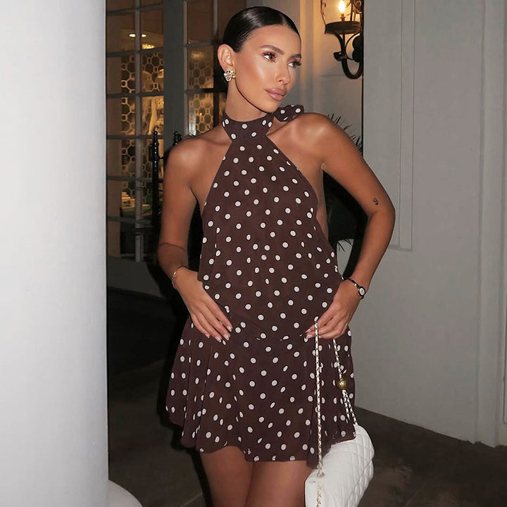 Damern luftig spetsklänning med halterneck och punktmönster Mirla-Eva Jonsson