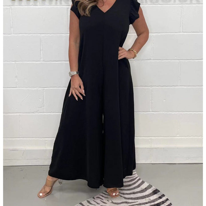 Damern luftigt jumpsuit med vida ben och V-ringning Mirla-Eva Jonsson