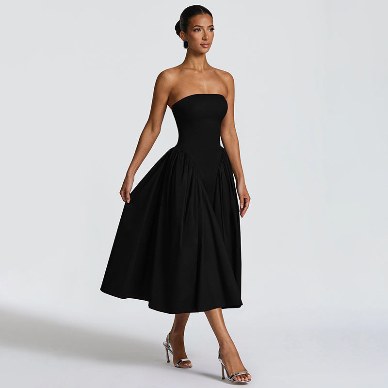 Damern maxiklänning med off-shoulder design och flödande silhuett Mirla-Eva Jonsson