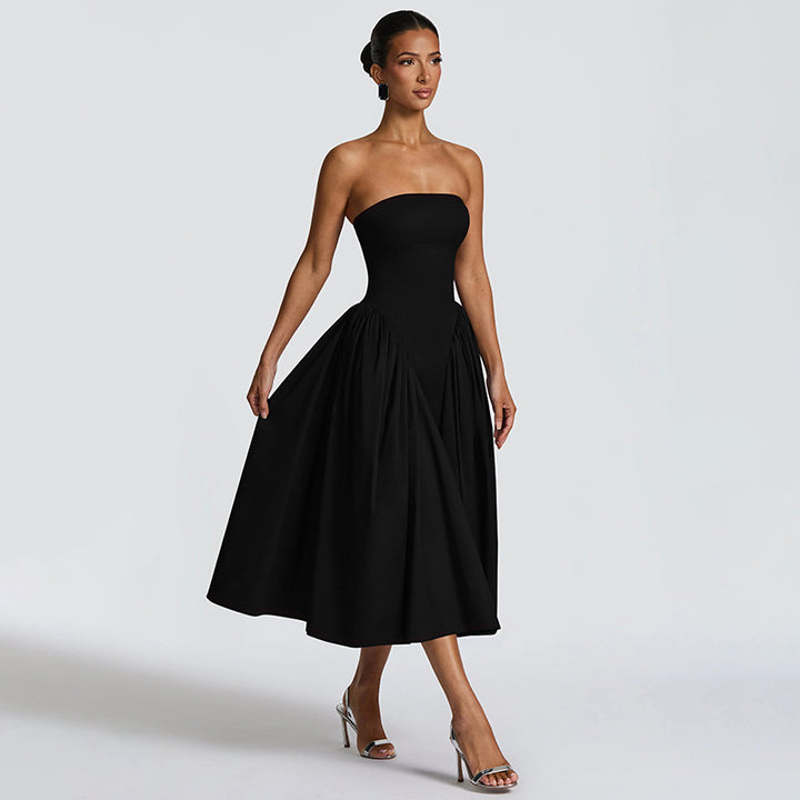 Damern maxiklänning med off-shoulder design och flödande silhuett Mirla-Eva Jonsson