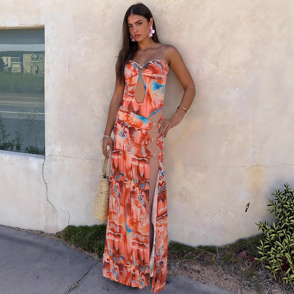 Damern maxiklänning med raffinerade cut-outs och eleganta band Mirla-Eva Jonsson