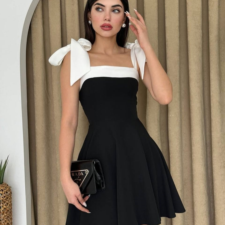 Damern moderiktigt sommarklänning med slinga-bärande och smickrande snitt Mirla-Eva Jonsson