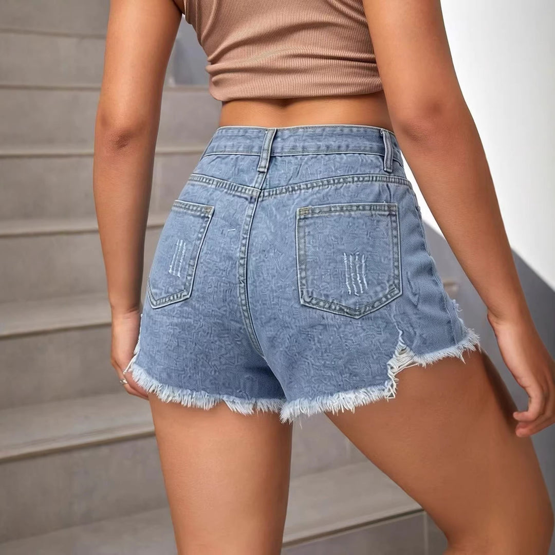 Damern modiska Destroyed Denim-shorts med fransig fåll Mirla-Eva Jonsson