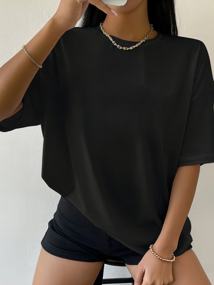 Damern överdimensionerad bomull T-shirt med rak skärning och minimalistisk design Mirla-Eva Jonsson