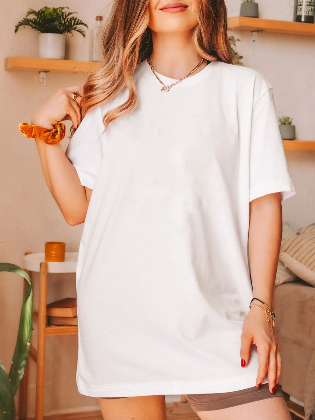 Damern överdimensionerad bomull T-shirt med rak skärning och minimalistisk design Mirla-Eva Jonsson