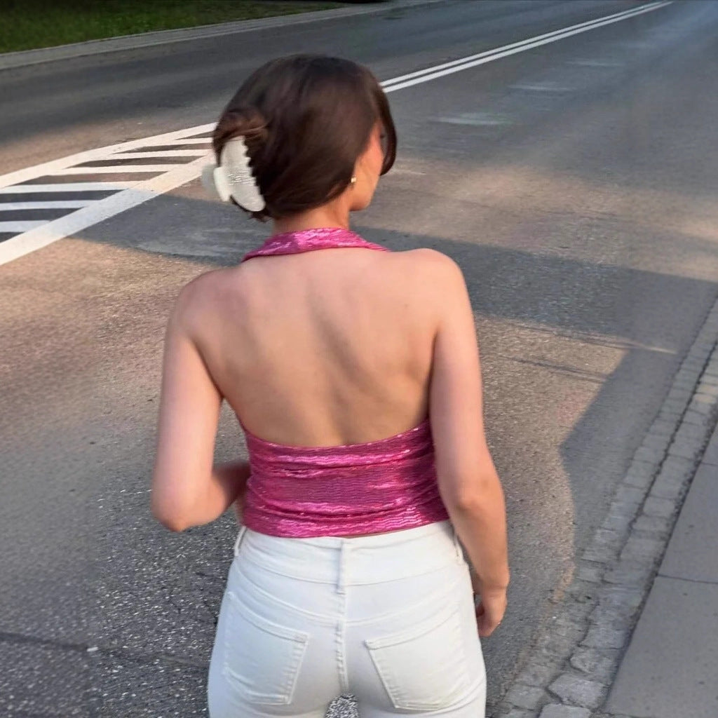 Damern rygglös topp med djup V-hals och raffinerade volangdetaljer Mirla-Eva Jonsson