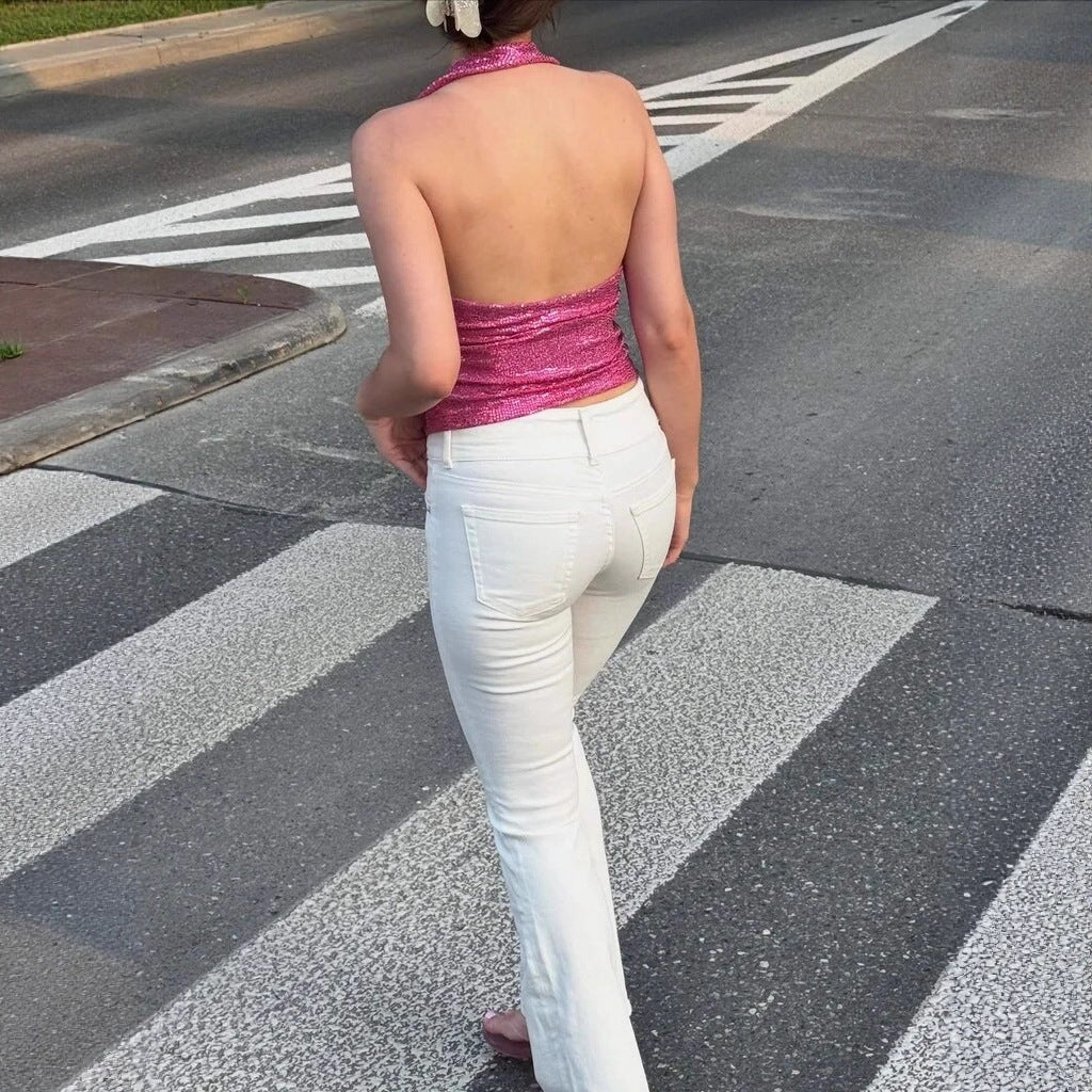 Damern rygglös topp med djup V-hals och raffinerade volangdetaljer Mirla-Eva Jonsson