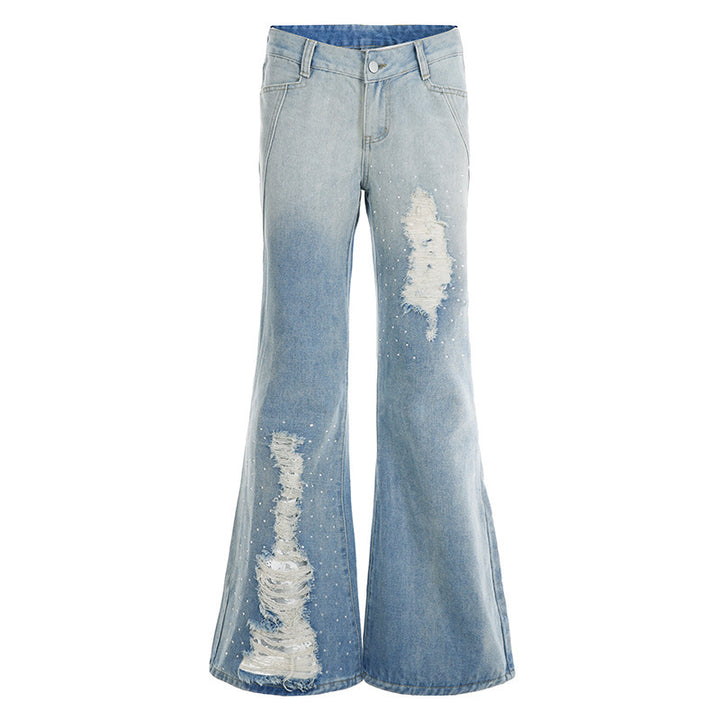 Damern slagjeans med modiga förstörda detaljer och bekväm passform Mirla-Eva Jonsson