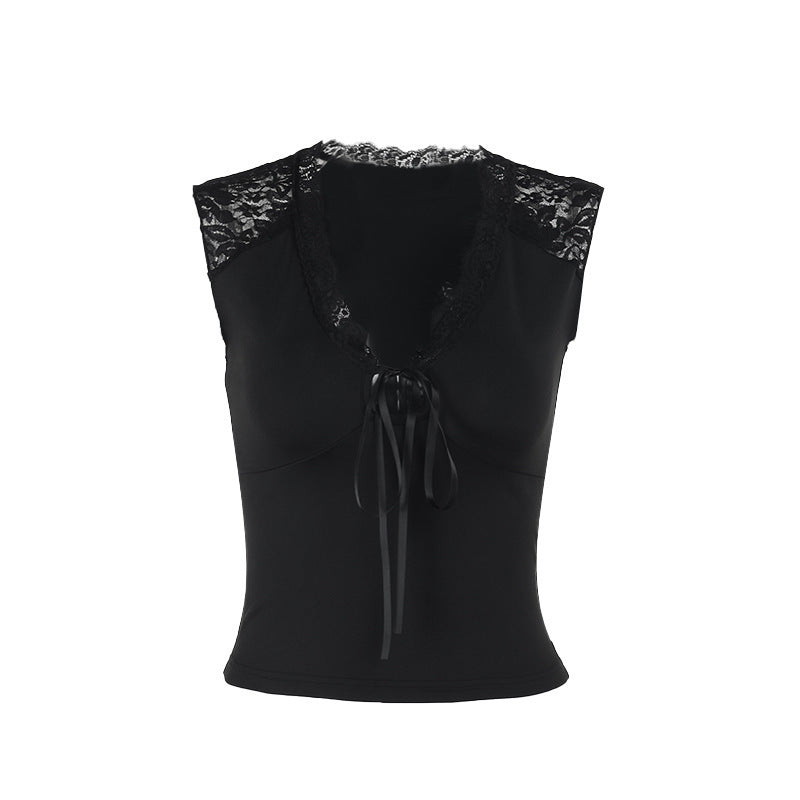 Damern spets-bustier med dekorativa rosett-detaljer Mirla-Eva Jonsson