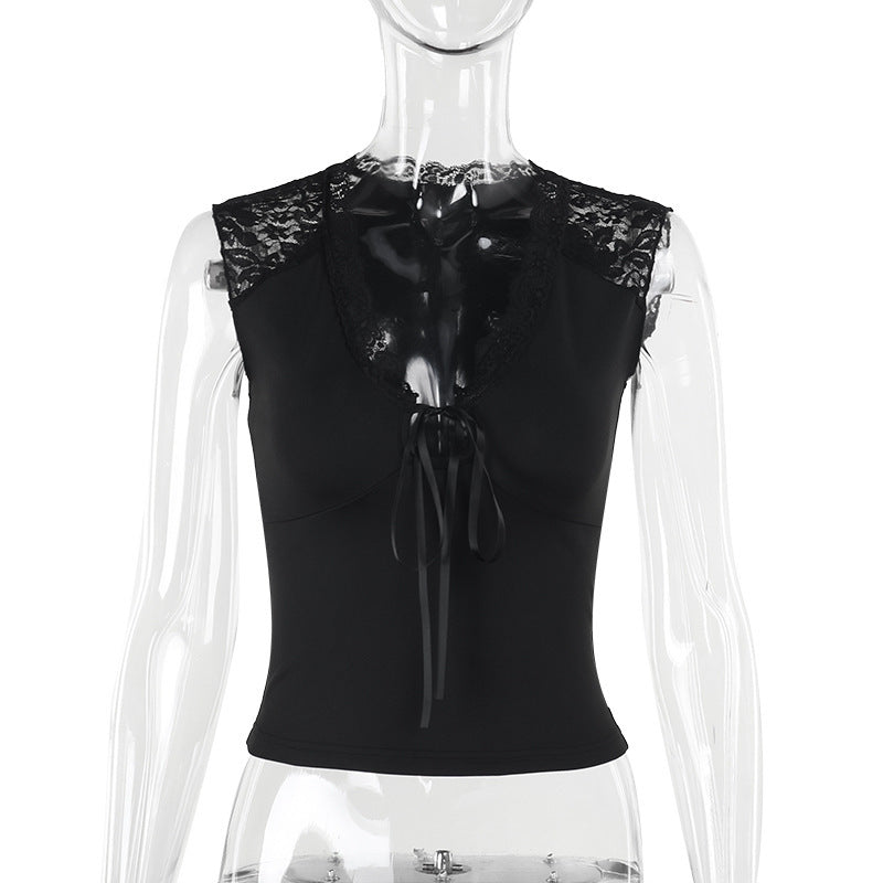 Damern spets-bustier med dekorativa rosett-detaljer Mirla-Eva Jonsson