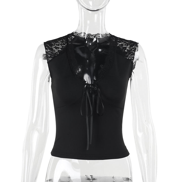 Damern spets-bustier med dekorativa rosett-detaljer Mirla-Eva Jonsson