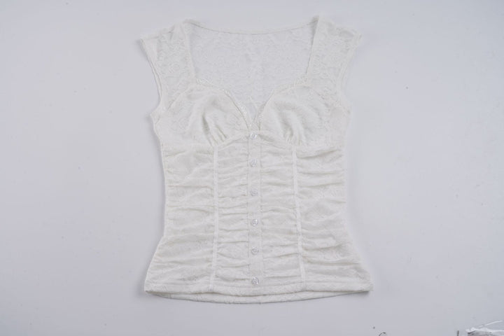 Damern spets-crop-top med elegant V-ringning och volangdetaljer Mirla-Eva Jonsson
