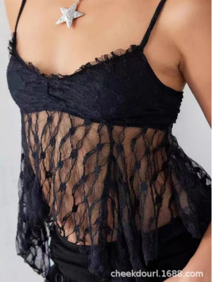 Damern spetstopp med transparenta detaljer och fina band Mirla-Eva Jonsson