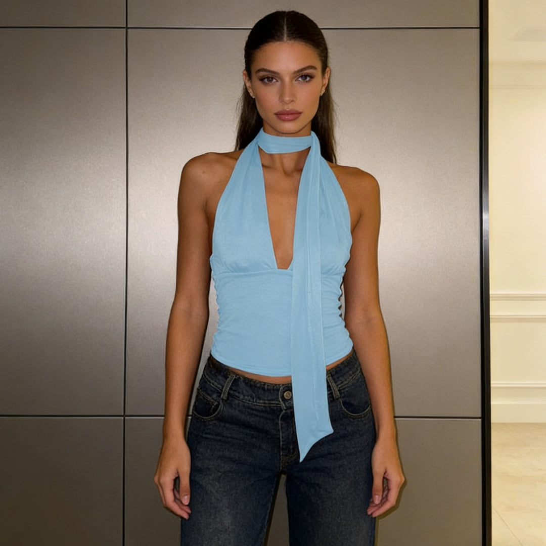Damern stilfullt cropped top med smal halsprydnad Mirla-Eva Jonsson