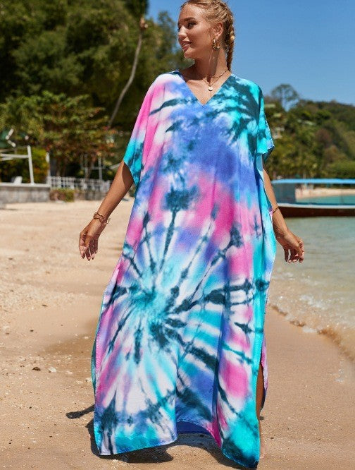 Damern strandklänning med färgglad batikdesign och vida ärmar Mirla-Eva Jonsson