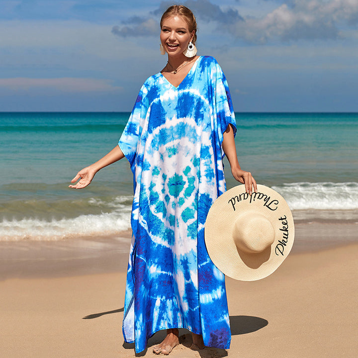 Damern strandklänning med färgglad batikdesign och vida ärmar Mirla-Eva Jonsson