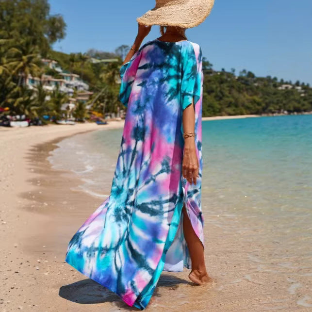 Damern strandklänning med färgglad batikdesign och vida ärmar Mirla-Eva Jonsson