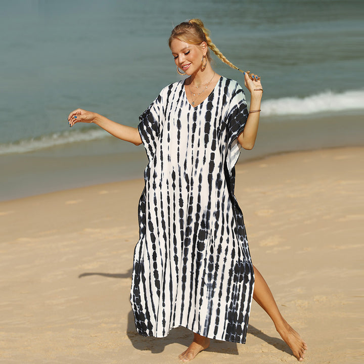 Damern strandklänning med modern batikmönster och avslappnad passform Mirla-Eva Jonsson
