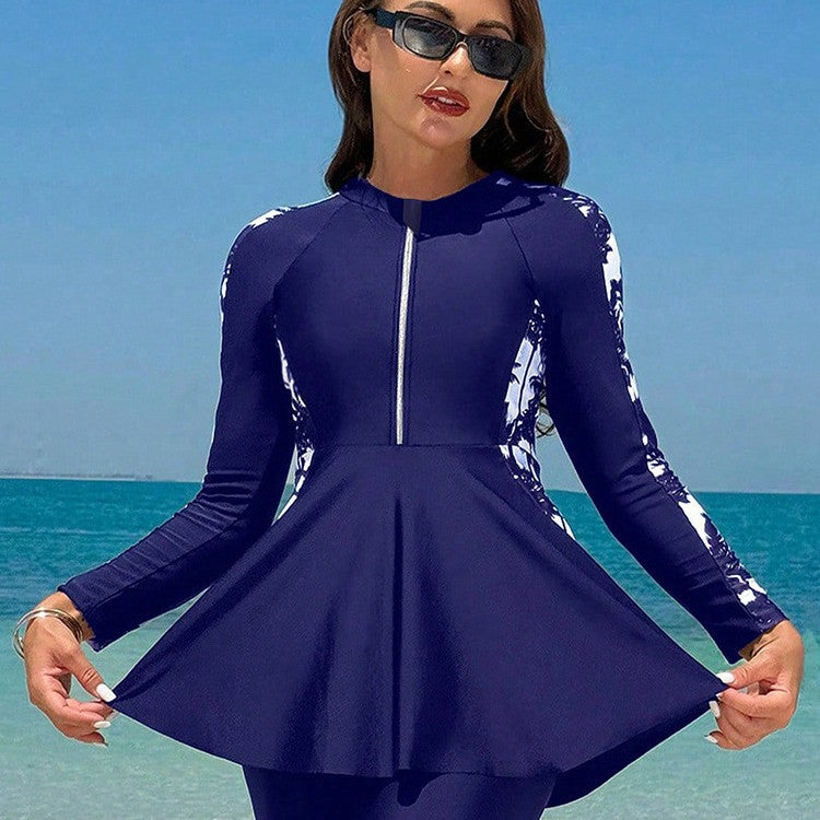 Damern surfdräkt med elegant A-linje och långa ärmar Mirla-Eva Jonsson