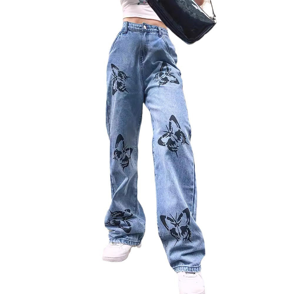 Damern vida jeans med iögonfallande fjärilstryck Mirla-Eva Jonsson