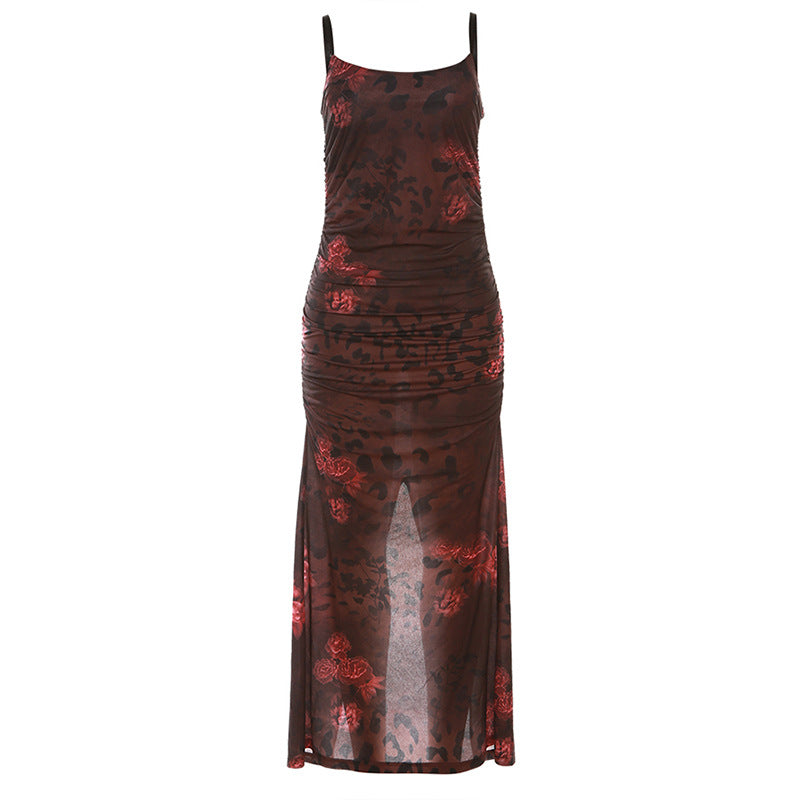 Damern wrap dress med sofistikerade volangdetaljer och elegant transparens Mirla-Eva Jonsson