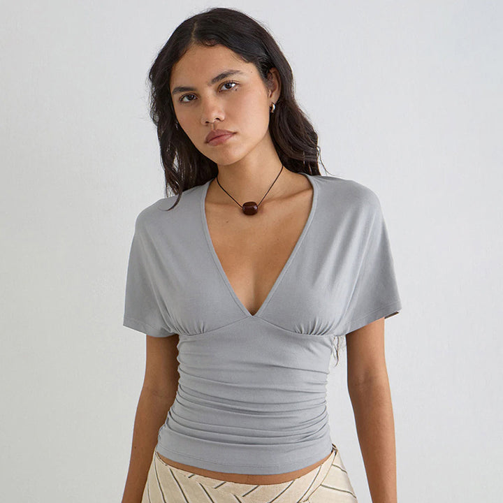Damern wrap-top med djup V-ringning och volang Mirla-Eva Jonsson