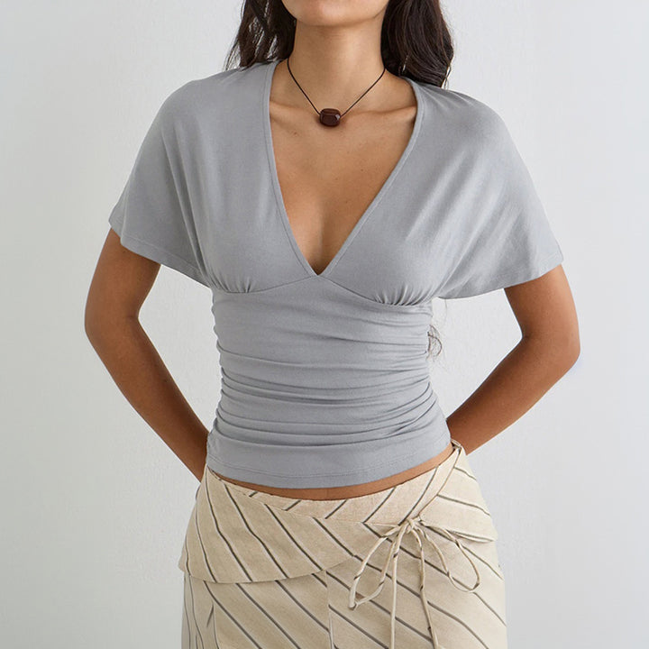 Damern wrap-top med djup V-ringning och volang Mirla-Eva Jonsson