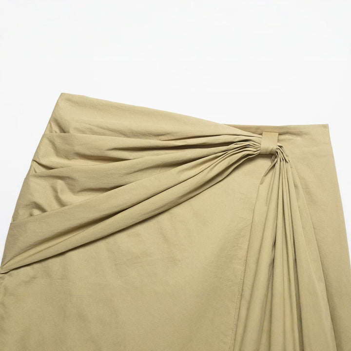 Damern wrapping skirt with asymmetric design and decorative drapes Mirla-Eva Jonsson