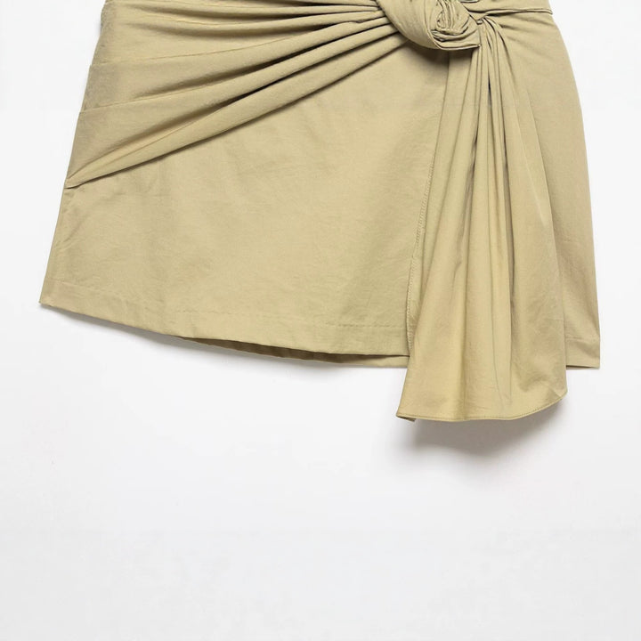 Damern wrapping skirt with asymmetric design and decorative drapes Mirla-Eva Jonsson