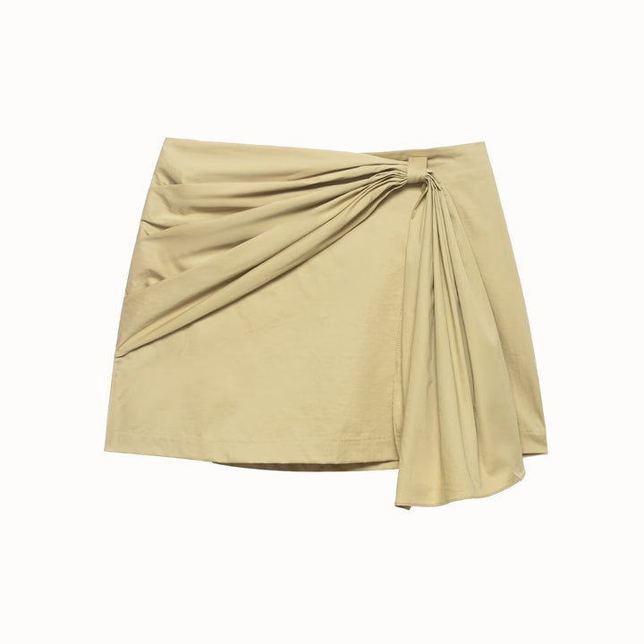 Damern wrapping skirt with asymmetric design and decorative drapes Mirla-Eva Jonsson