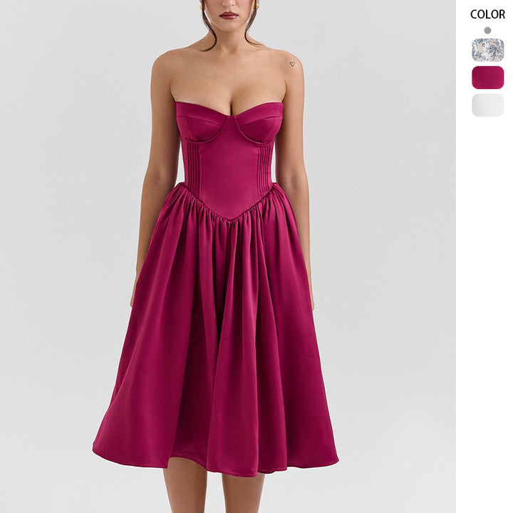 Damerna couture-klänning i en off-the-shoulder bärremdesign med en voluminös kjol Mirla-Eva Jonsson