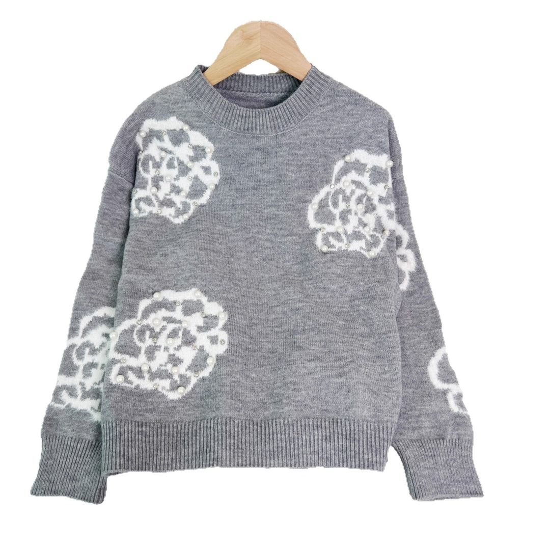 Damerna fashionable pullover med detaljerade blommor appliker och pärl dekorationer Mirla-Eva Jonsson