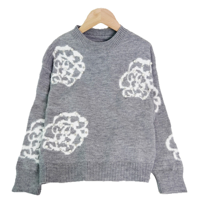 Damerna fashionable pullover med detaljerade blommor appliker och pärl dekorationer Mirla-Eva Jonsson
