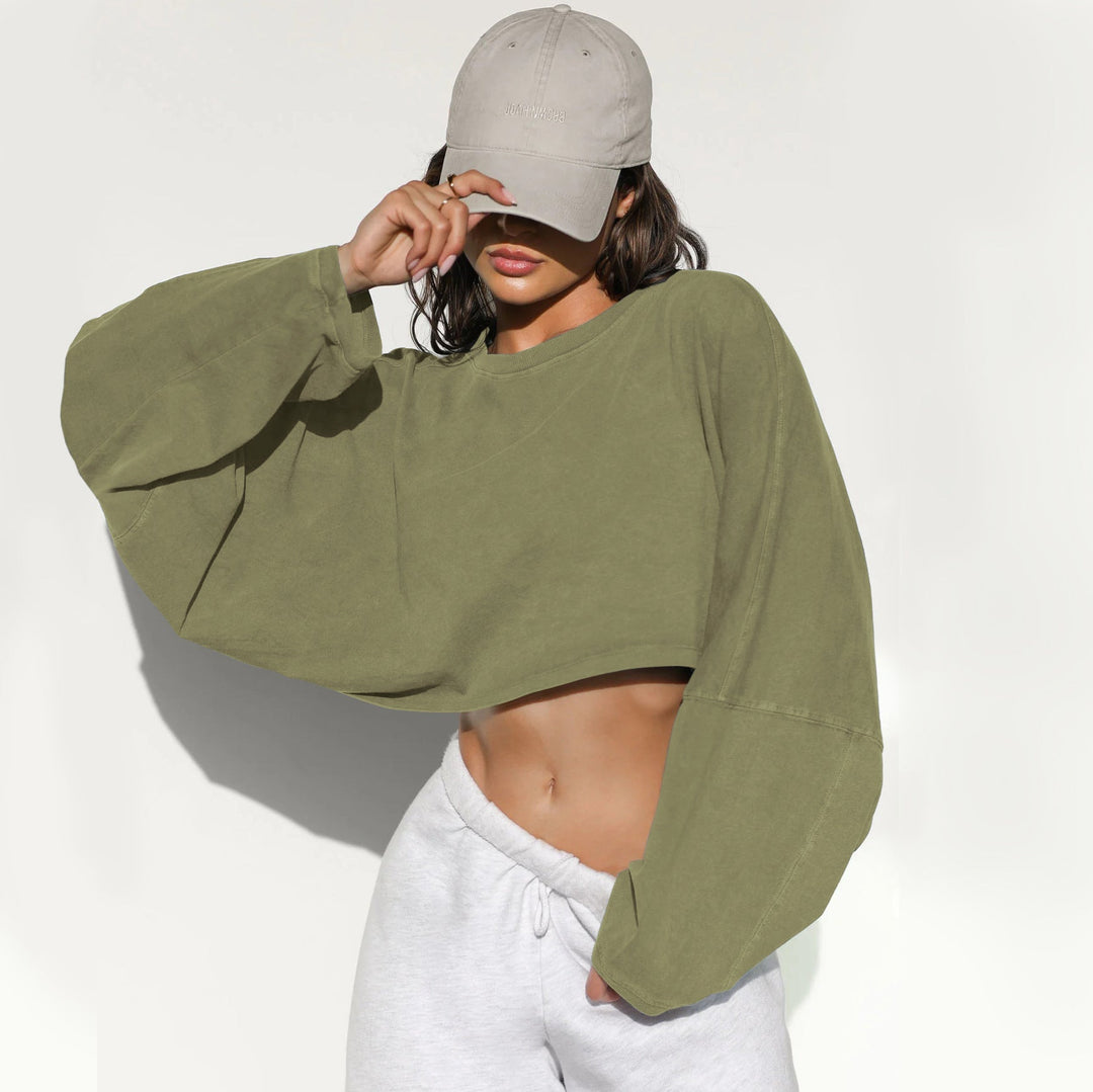 Damernas Avslappnad Cropped Sweatshirt med Låg Skärning och Ballongärmar Mirla-Eva Jonsson