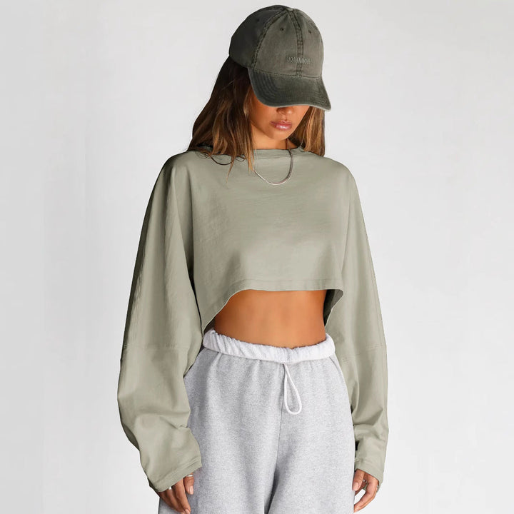 Damernas Avslappnad Cropped Sweatshirt med Låg Skärning och Ballongärmar Mirla-Eva Jonsson
