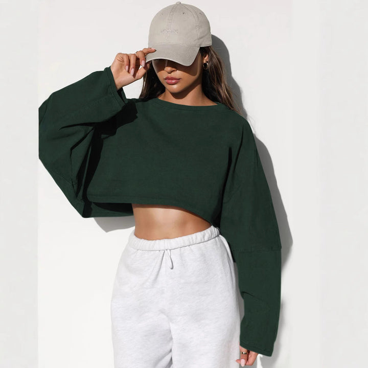 Damernas Avslappnad Cropped Sweatshirt med Låg Skärning och Ballongärmar Mirla-Eva Jonsson