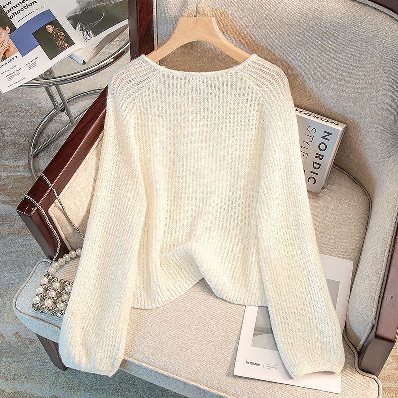 Damernas Avslappnade Tröja med Off-Shoulder Design och Glittrande Detaljer Mirla-Eva Jonsson