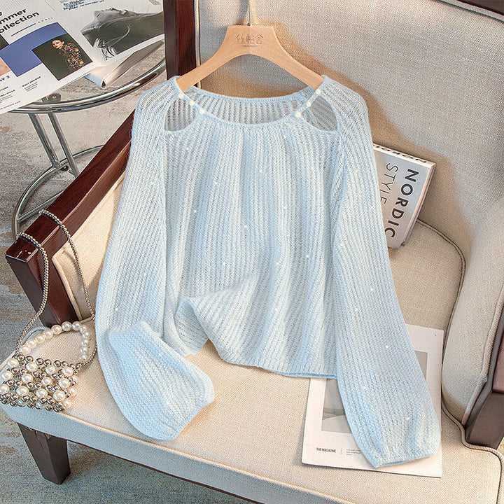 Damernas Avslappnade Tröja med Off-Shoulder Design och Glittrande Detaljer Mirla-Eva Jonsson