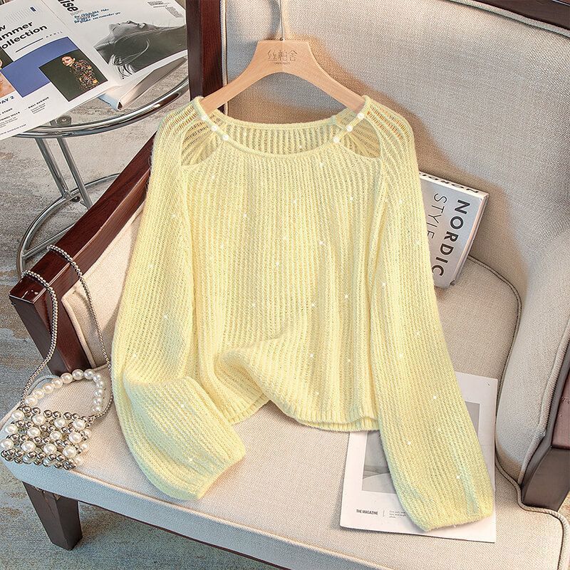 Damernas Avslappnade Tröja med Off-Shoulder Design och Glittrande Detaljer Mirla-Eva Jonsson