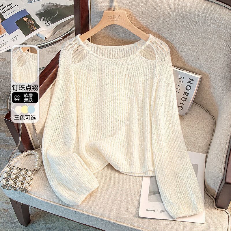 Damernas Avslappnade Tröja med Off-Shoulder Design och Glittrande Detaljer Mirla-Eva Jonsson