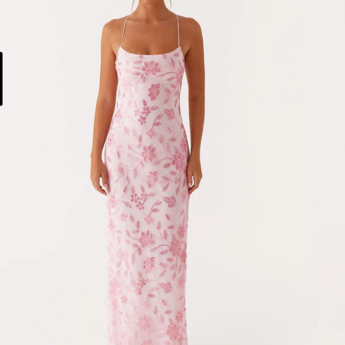 Damernas Couture Maxi Klänning med Blommig Smockdesign och Fängslande Bak.-Eva Jonsson