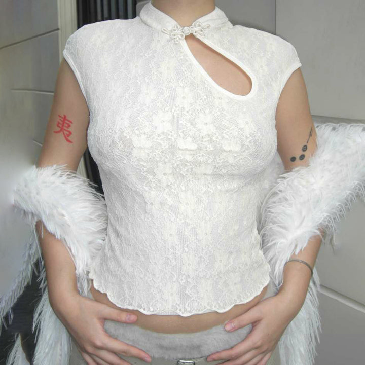 Damernas Crop-top med blommigt spetsmönster och detaljerad halterneck Mirla-Eva Jonsson